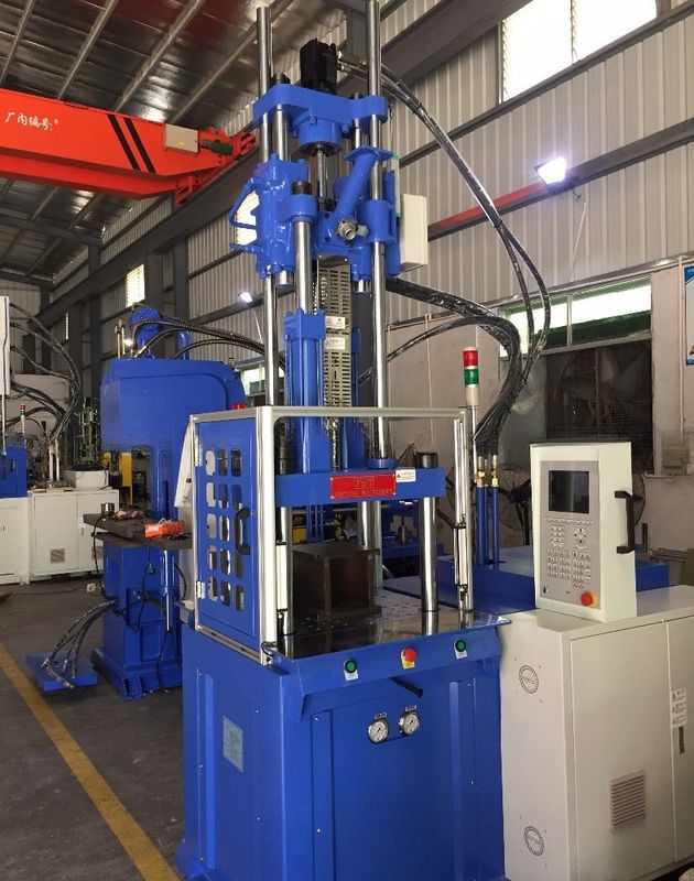 Máquina de moldeo por inyección vertical hidráulica de 55T con 2 mesas de trabajo